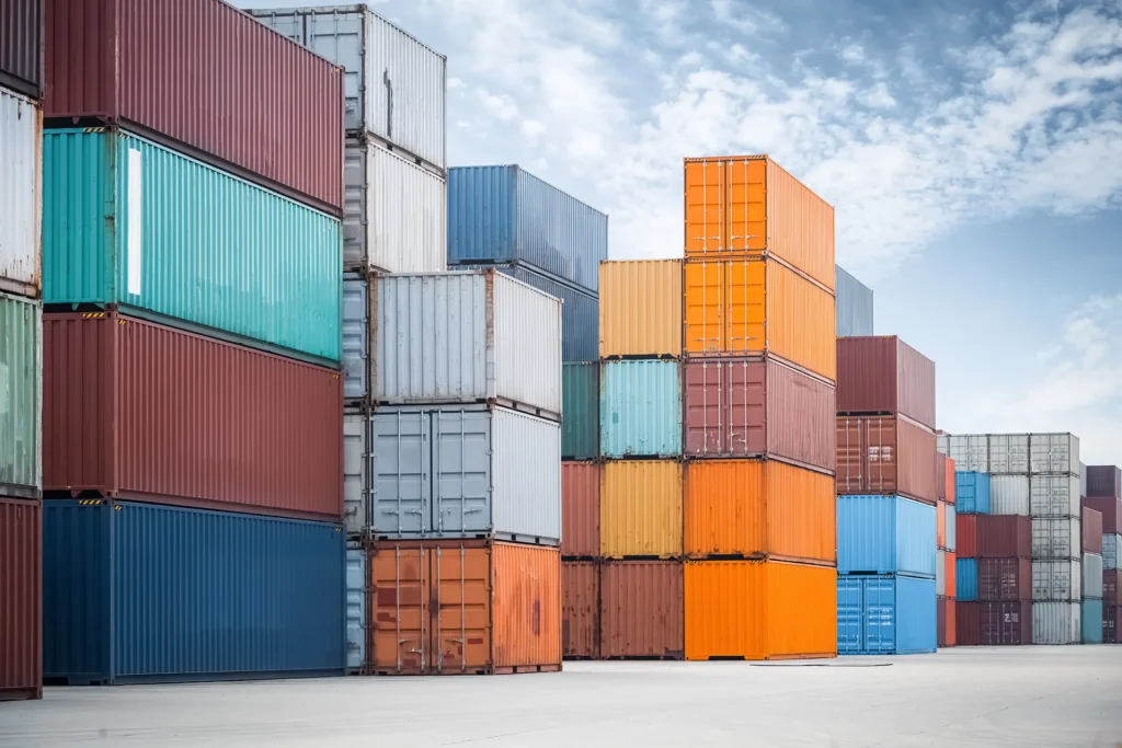 Colorful shipping containers stacked at port